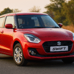 Maruti Suzuki Swift 2025 red hatchback front view for review, price, variants and mileage