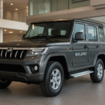 2025 Mahindra Bolero front view showing new grille, alloy wheels and design updates