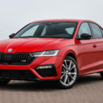Skoda Octavia RS 2025 Launch in India showing premium red sports sedan with bold design, alloy wheels, and powerful 2.0L turbo engine.