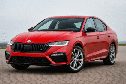 Skoda Octavia RS 2025 Launch in India showing premium red sports sedan with bold design, alloy wheels, and powerful 2.0L turbo engine.