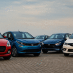 Top 5 hatchback cars in India 2025 — A high-resolution image showcasing five popular hatchback models including Maruti Swift, Tata Altroz, Hyundai i20, Maruti Baleno, and Toyota Glanza, representing India's best compact car lineup.