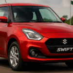 Maruti Swift Mileage 2025-Maruti Swift 2025 new model in red color parked on Indian road — highlighting best-in-class mileage, CNG version, and fuel-efficient Z-series engine.