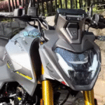 Hero Xtreme 160R 4V Combat Edition Launch — close-up front view showcasing LED headlamp design, golden USD forks, and aggressive streetfighter styling | Automobile9